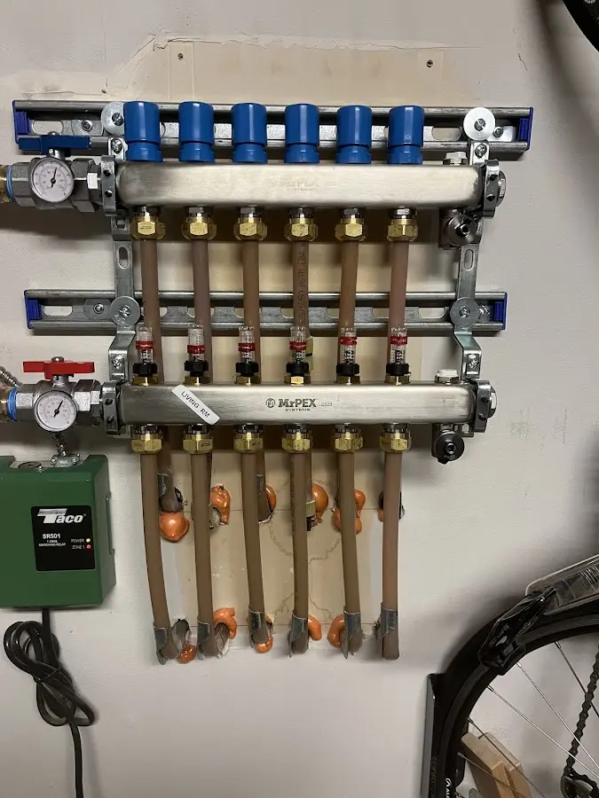 Plumber performing Gas Leak Detection at a residential property in Pittsford